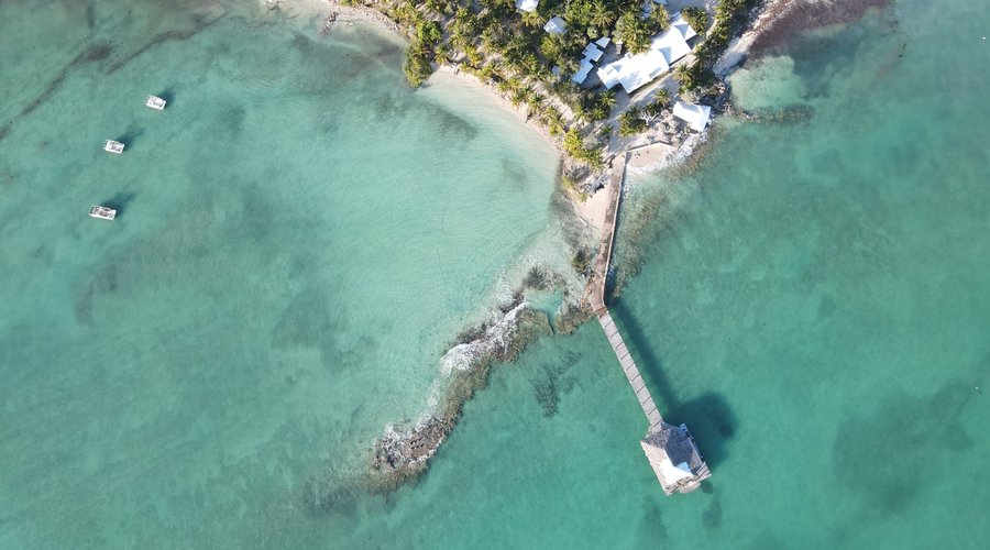 Aerial view of Small Hope Bay Lodge.