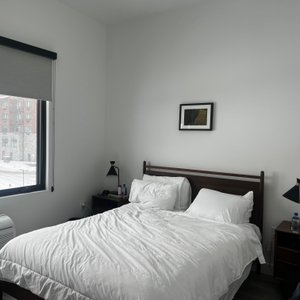 No attention to detail.  Tiny framed art over queen size bed, inconsistent heat/cooling system/polyester bedding/cold floors no area rugs.
