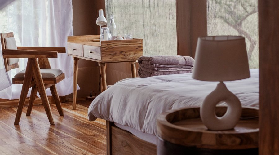 Our spacious family, single, and double suites are thoughtfully designed offering ample room for you and your loved ones to relax. Each suite features a private bathroom, a cozy lounge area, and a functional desk to ensure comfort and convenience throughout your stay.