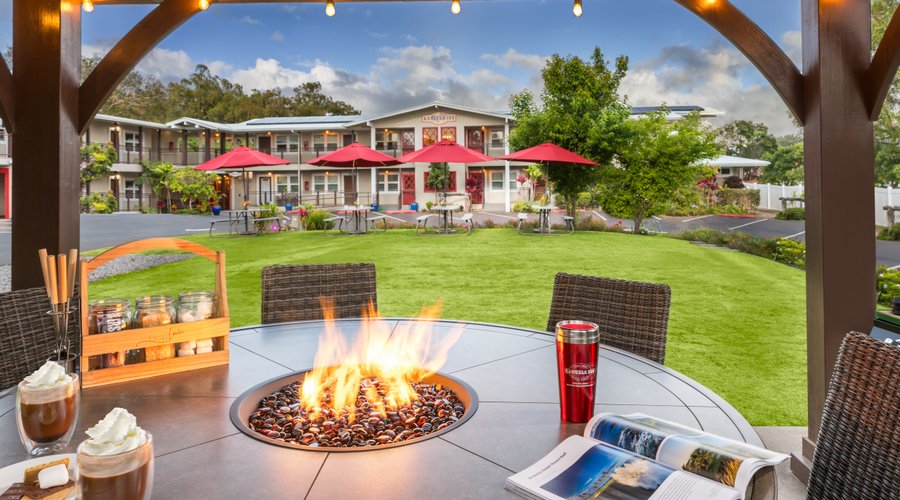 Outdoor gazebo with fire table and seating for 6.  A gas bbq grill is available on a first come, first served basis.