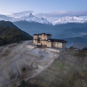 Sarangkot Mountain Lodge, located in Pokhara, offers a serene and comfortable retreat with a range of amenities. Situated 10 km from Pokhara Lakeside, the lodge features free bikes, an outdoor swimming pool, and a garden, making it a great base for outdoor activities like hiking and cycling. The property is also 10 km from Fewa Lake and 12 km from Devi's Falls.  