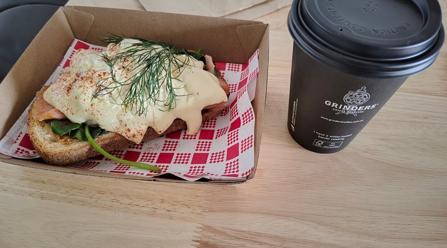 Eggs benedict with fake hollandaise sauce a large coffee