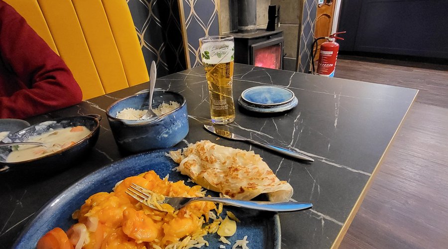 Prawn roast beside a log fire. Warmth in and around.