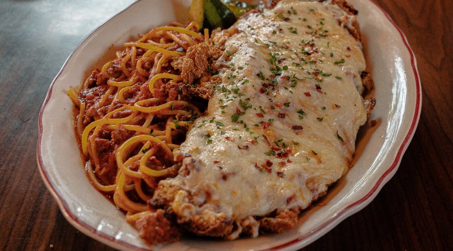 Our chicken parmesan with pasta is nearly a meal for two! 