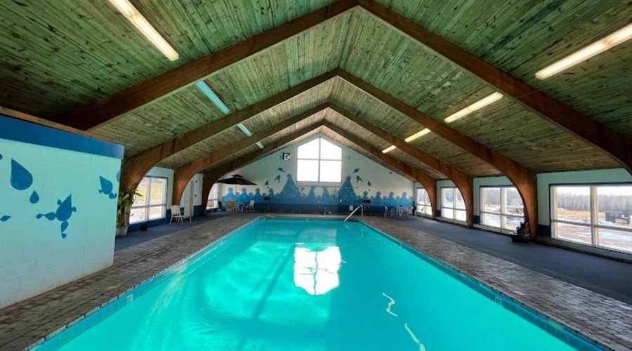 Relax and unwind at the Presque Isle Hotel’s inviting pool, the perfect spot to cool off after a day of exploring Maine’s beautiful surroundings. Whether you're taking a leisurely swim or soaking up the sun by the water, this peaceful pool area offers a tranquil retreat. With a clean, well-maintained space and comfortable lounge chairs, it's the ideal place to relax and refresh. Located conveniently at the hotel, it's a great way to enhance your stay in Presque Isle!