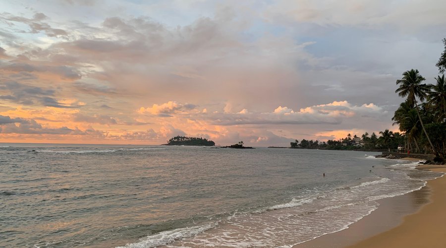 Waves, whispers, and warm hues 