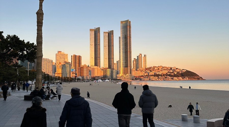 One of my favourite place to visit in Busan. I like the contrast of nature and urban area, and it is definitely one of those places with ocean on one side and crowded city right next to it.  Definitely one of the places to visit if traveling to Korea.  The send on the beach is silky and clean. It is very soft. Kids can’t stop playing there.  There are many places to see near by and experience like aquarium and tram, which goes along the sea.