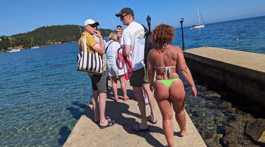 the pier, waiting to get the beach taxi to Skiathos Town.