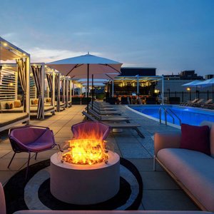 Deck 11 pool and cabanas at night