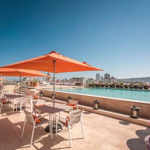 Perched atop the hotel is a top-floor terrace where guests can indulge in delectable Caribbean dishes while feasting their eyes on a breathtaking panoramic view encompassing the old city, new city, the Caribbean Sea, Cartagena’s bustling port, and the picturesque landscapes beyond. This level also features a solarium and pool, inviting guests to relax and unwind in the lap of luxury.