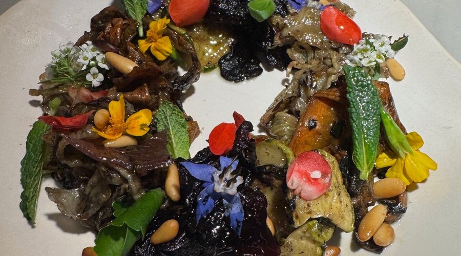 An appetizer of thinly sliced vegetables.