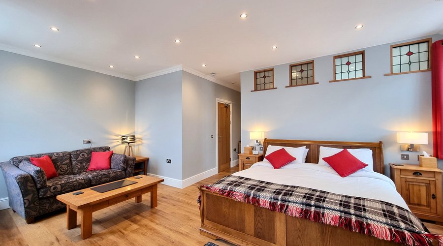 Suite 201 - main bedroom with super king sized bed and sitting area