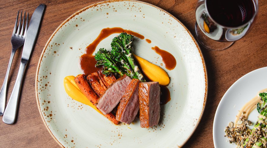 Orange Glazed Fraser Valley  Duck Breast |  Chilli Butter Carrots | Grilled Broccolini | Bordelaise Jus