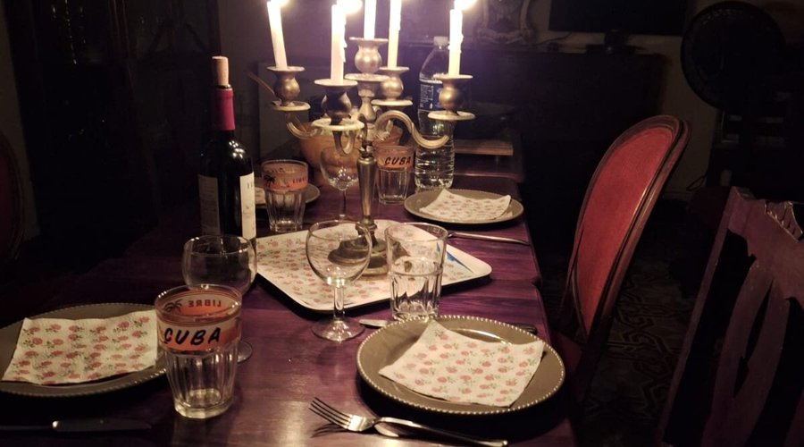 Power failure and curfew due to hurricane. So a candlelight dinner with the owners