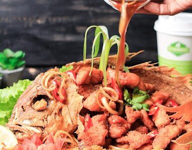 Fried gourami with moringa sweet and sour sauce by Lamoringa Labuan Bajo