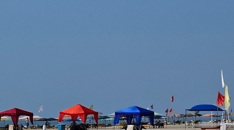 More colourful gazebos on the beach 
