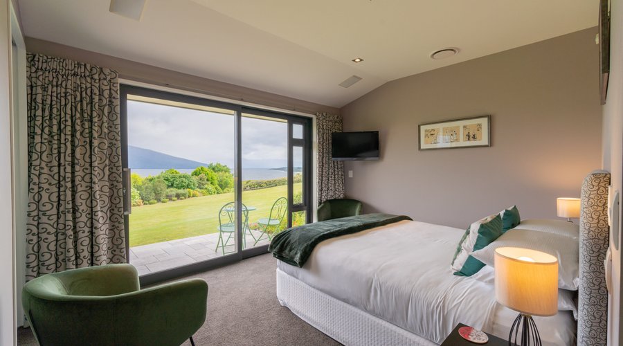 Our South Arm room complete with king bed and beautiful views to Lake Te Anau