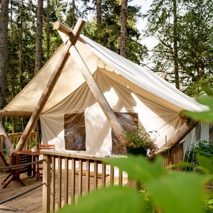 Every room has a balcony, a mosquito net, and drapes for full privacy. 