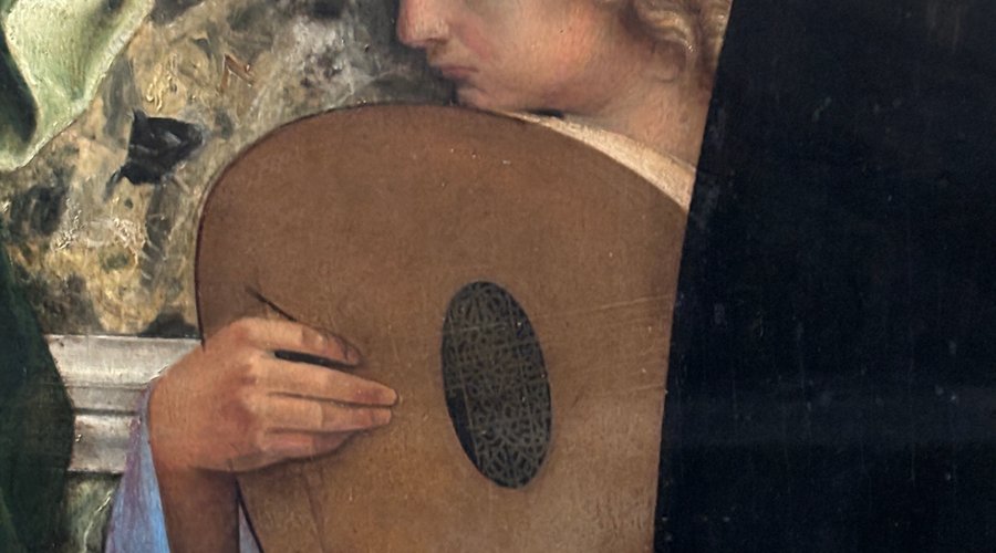 A small part of a painting playing music.