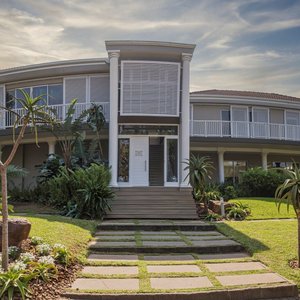 Palmtree Villa has 6 on-suite bedrooms, Invertor, Pool, Jacuzzi, serivced (Except on Public holidays and Sundays), WIFI, JoJo tank, DSTV.