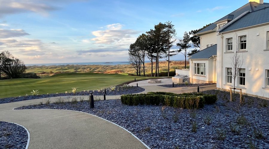 External grounds and putting green overlooking Royal Portrush 4th fairway.