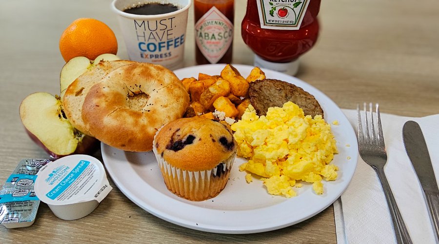 We offer a complimentary, all-you-can-eat hot breakfast buffet, featuring a variety of delicious options to fuel your day.