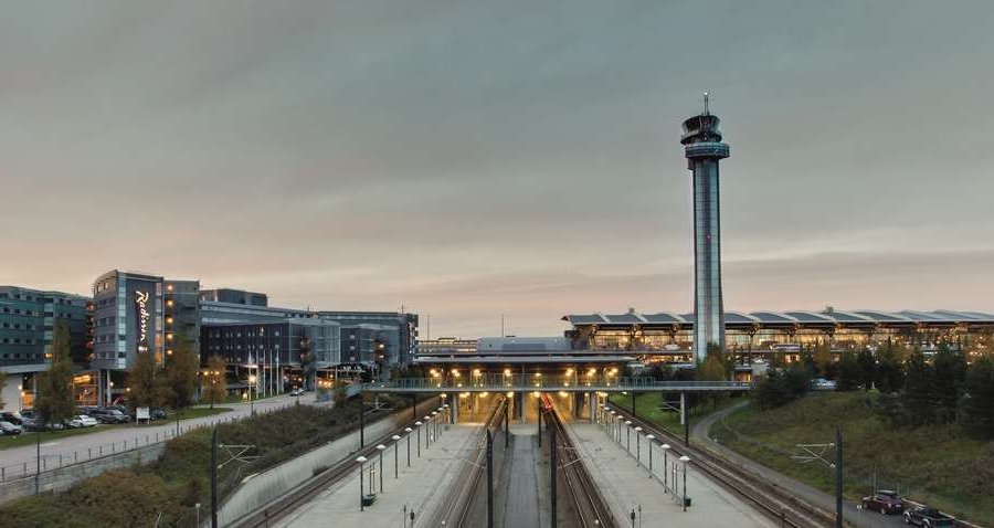 Hotel exterior and airport from the train station