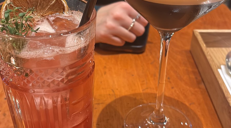 A redcurrant and rosemary cocktail and an espresso martini