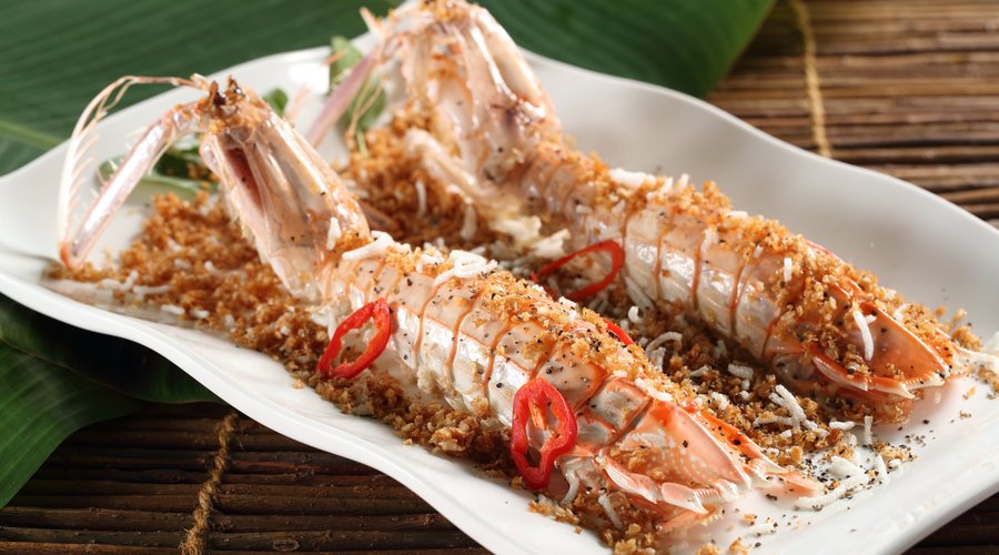 Mantis Shrimp deep-fried with salt and pepper, creating a crispy, flavorful bite.
