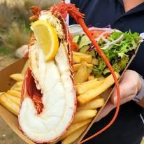 Half Crayfish with chips and salad, now available as a part of our fisherman's favourites. 