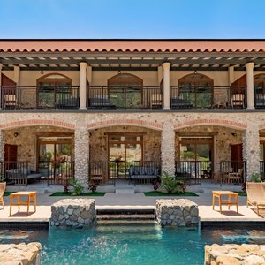 Hotel La Compañia del Valle including 70 spacious rooms and suites with balconies and terraces overlooking the area mountains and garden courtyard.