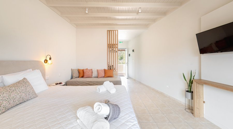 Authentic Corfiot Hospitality – Modern Rooms at Dominoes Corfu in Ipsos 