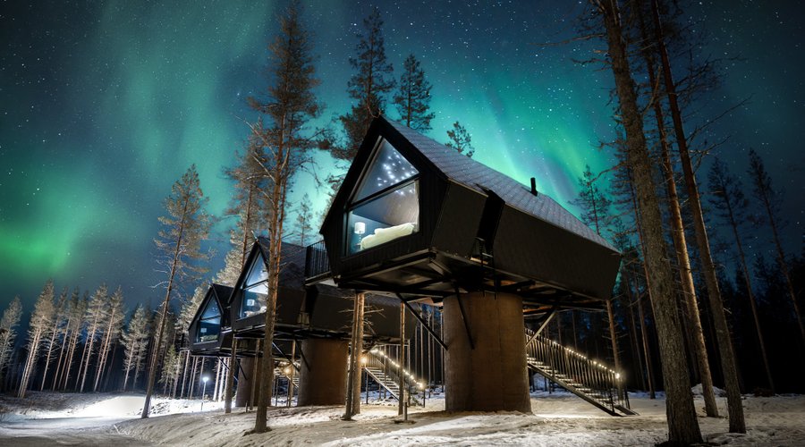 Enjoy a luxurious nature getaway in one of our Aurora Treehouses, a cosy cottage perched on a 3-metre pillar among Arctic evergreens. The panoramic window commands a magnificent view of the lake and gives you a front row seat to the spectacular winter display of Northern Lights! The fine interior combines the charm of the countryside with the modern flair of Finnish design. The pine panelling and warm king-size bed alone will give you a sense of great comfort. The only downside: you'll find it.