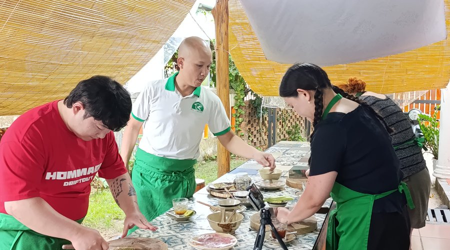 Experience the Joy of Vietnamese Cooking with Chef Troc! Imagine learning to create authentic, mouthwatering Vietnamese dishes in a fun and welcoming environment. At Troc's Kitchen & Cooking Class in Phu Quoc, you'll do just that! Chef Troc's passion for cooking is contagious, and his friendly approach makes learning easy and enjoyable for everyone, regardless of your skill level. You'll work with fresh, local ingredients and discover the secrets behind classic Vietnamese flavors. 