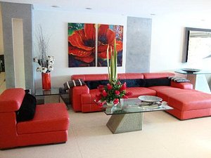 Hotel Alameda de la 10 in Medellin, image may contain: Couch, Living Room, Table, Home Decor