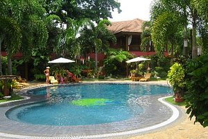 Boracay Tropics Resort Hotel in Panay Island, image may contain: Resort, Hotel, Villa, Person