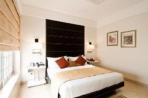 Hotel Residency Fort in Mumbai, image may contain: Interior Design, Home Decor, Cushion, Furniture