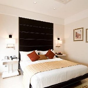 Hotel Residency Fort in Mumbai, image may contain: Interior Design, Home Decor, Cushion, Furniture