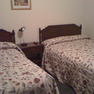 Room with two double beds