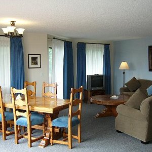 Heron's Landing Hotel in Vancouver Island, image may contain: Furniture, Bed, Bedroom, Room