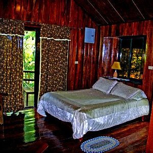 Single bed in one of the bungalows