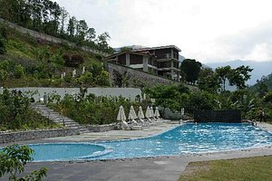 Club Mahindra Baiguney in Jorethang, image may contain: Villa, Hotel, Resort, Housing