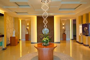 Jinhold Apartment Hotel Bintulu in Bintulu, image may contain: Indoors, Foyer, Chandelier, Lamp