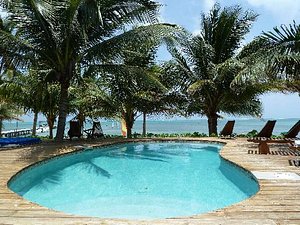 Caribbean Villas Hotel in Ambergris Caye, image may contain: Resort, Hotel, Summer, Pool