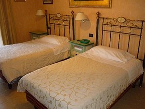 Hotel Sicilia in Sicily, image may contain: Bed, Furniture