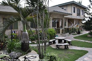 Harbour Chateau Resort in Tablas Island, image may contain: Villa, Resort, Hotel, Backyard