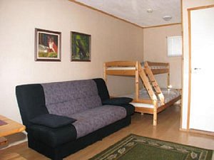 Motel Willis West in Rukatunturi, image may contain: Furniture, Couch, Home Decor, Dorm Room