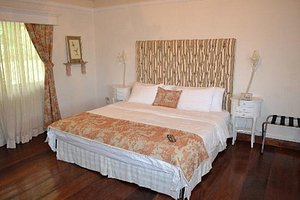 Finca Lerida in Boquete, image may contain: Furniture, Home Decor, Interior Design, Bed