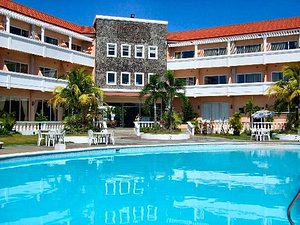 Vista Marina Hotel and Resort in Luzon, image may contain: Resort, Hotel, Building, Villa