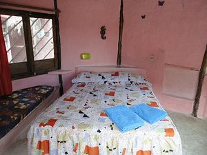 Acamaya Reef in Puerto Morelos, image may contain: Furniture, Bed, Bedroom, Room